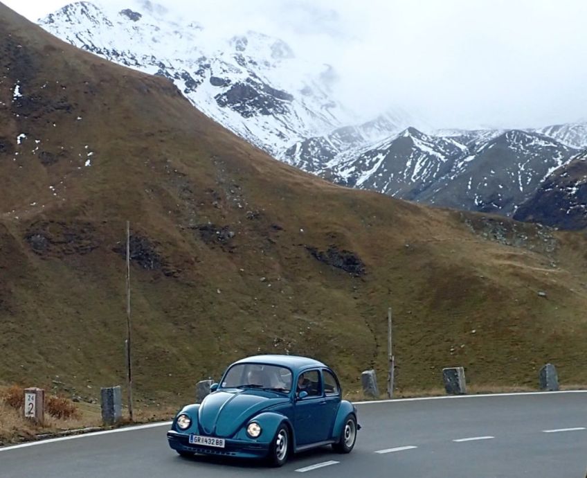 An age appropriate (and beautifully restored) bug makes its way up the Grossglockner High Alpine Highway