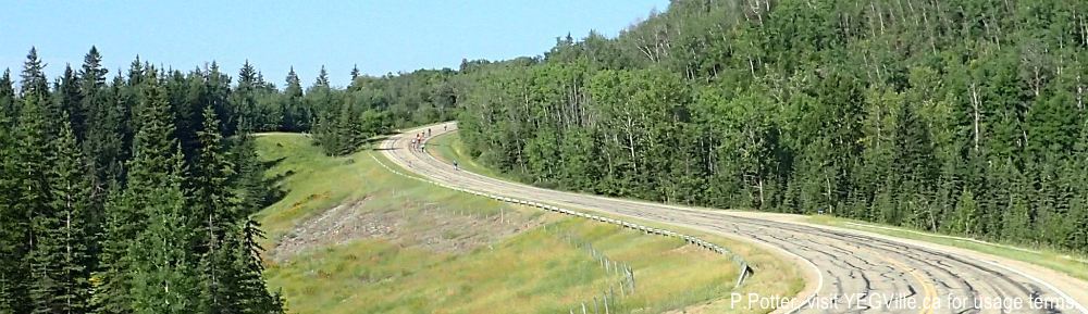 Cyclists climbing 'Bugger Hill'. 2024-08-08-Devon2Calmar